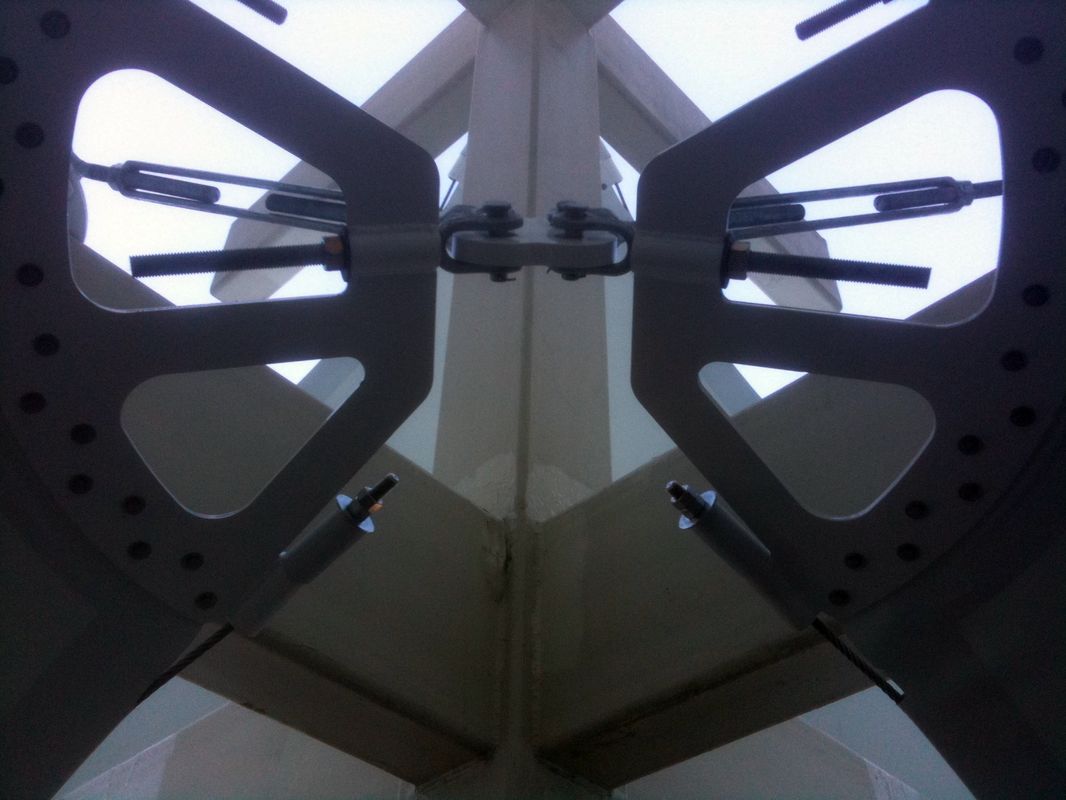 Close-up of metal beams and bolts forming a structural joint.